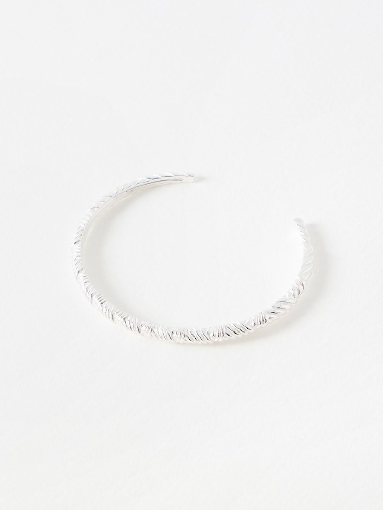 Oliver Bonas Silver Tone Zia Cross Over Textured Bangle - Image 1 of 4