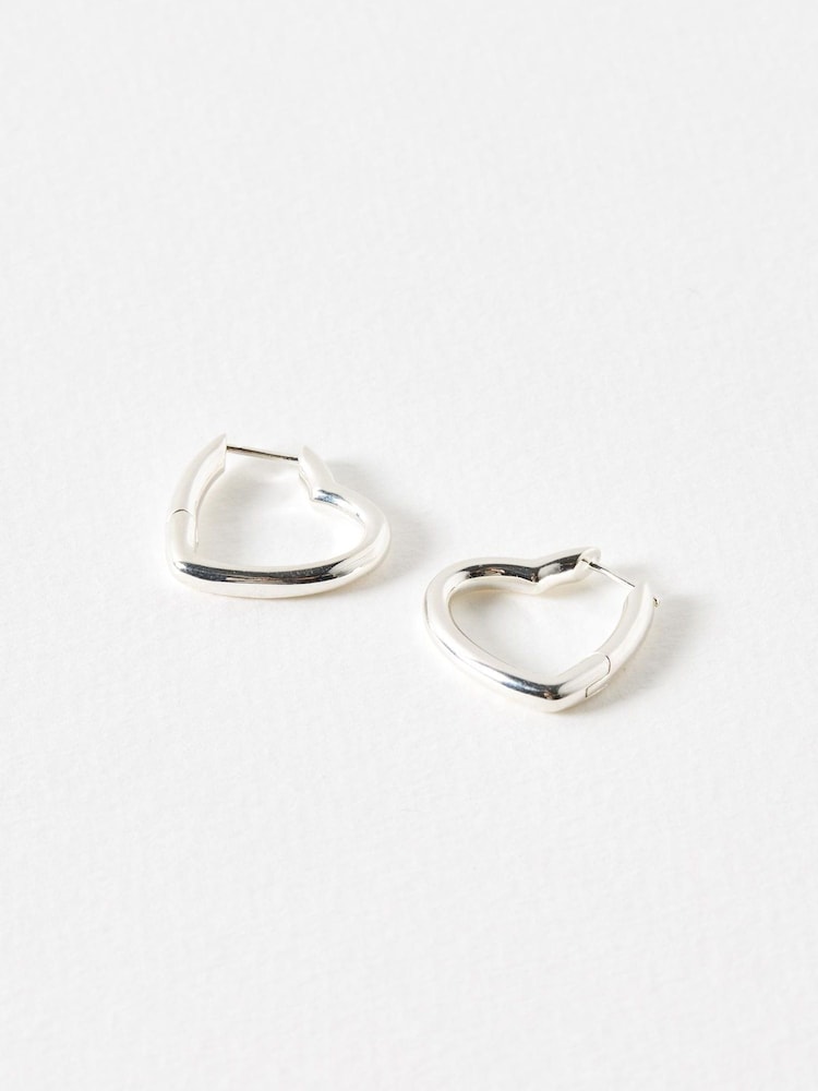 Oliver Bonas Silver Tone Polly Puffy Heart Profile Hoop Earrings - Image 1 of 4 Oliver Bonas Silver Tone Polly Puffy Heart Profile Hoop Earrings - Image 1 of 4