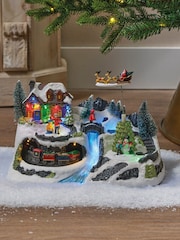 Lumineo LED Moving Village Scene With Santa Clause Christmas Decorations - Image 1 of 3