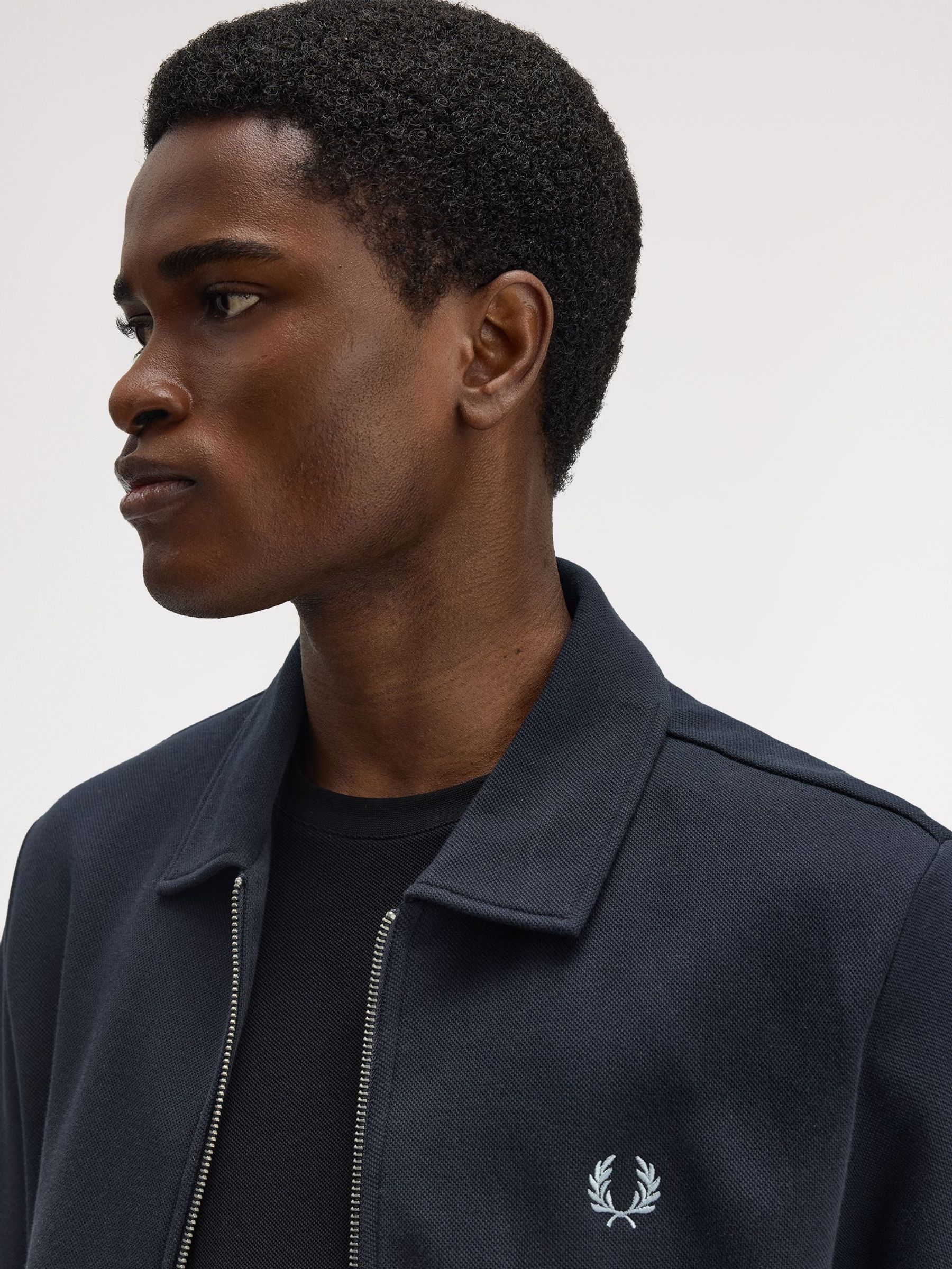 Buy Fred Perry Blue Zip Through Collared Sweatshirt from the Next