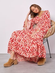 Apricot Red Ikat Swirls Bell Sleeve Maxi Dress - Image 1 of 5
