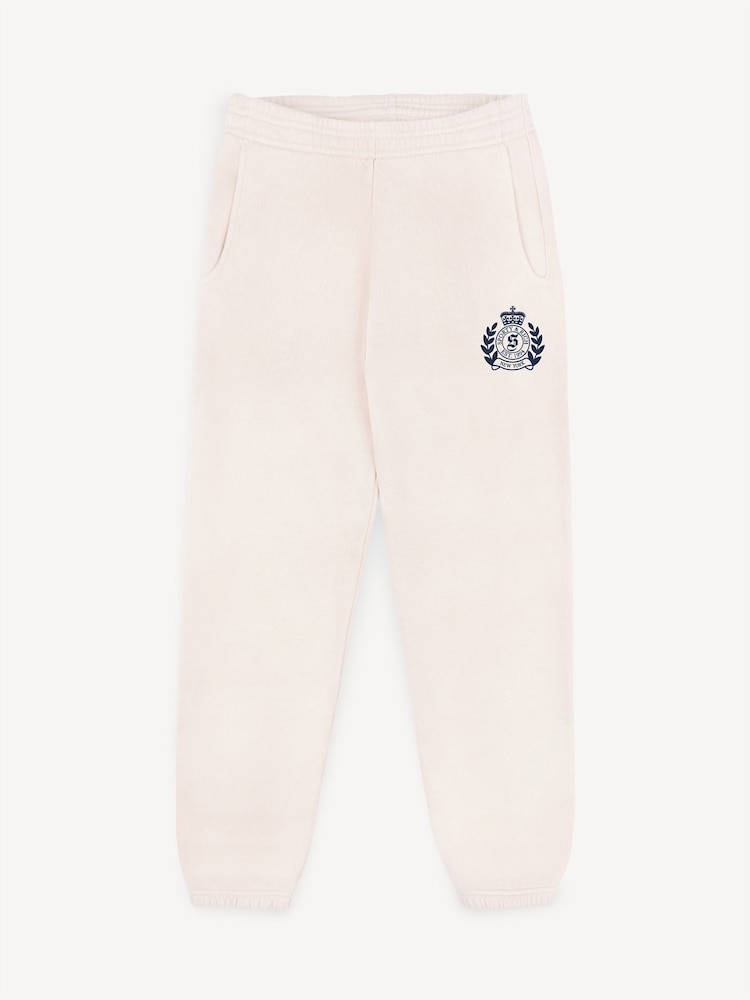 Sporty & Rich Cream Kids H&W Crest Sweatpants - Image 1 of 4 Sporty & Rich Cream Kids H&W Crest Sweatpants - Image 1 of 4