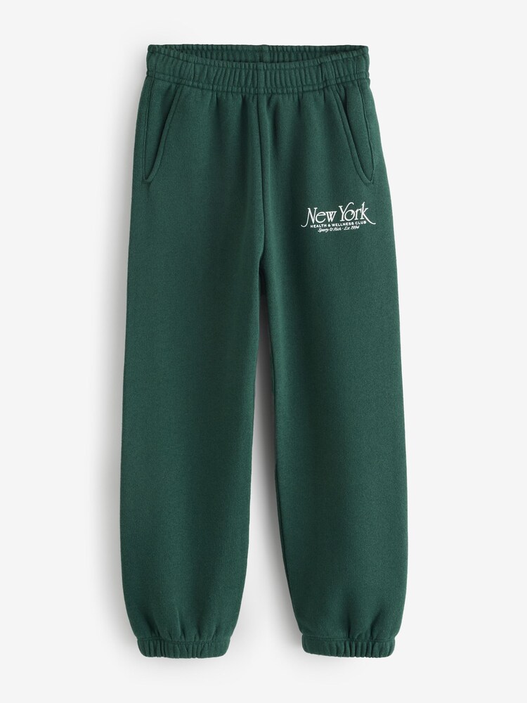 Sporty & Rich Green Kids NY 94 Sweatpants - Image 1 of 6 Sporty & Rich Green Kids NY 94 Sweatpants - Image 1 of 6