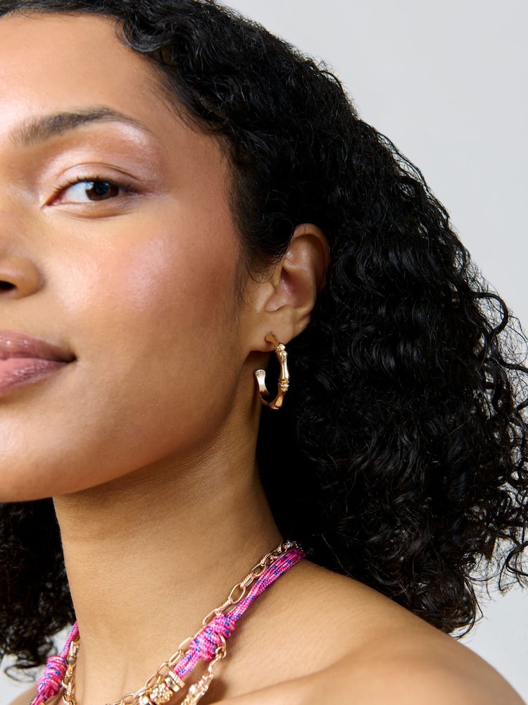 Aela Gold Tone Bamboo Hoop Earrings - Image 1 of 3