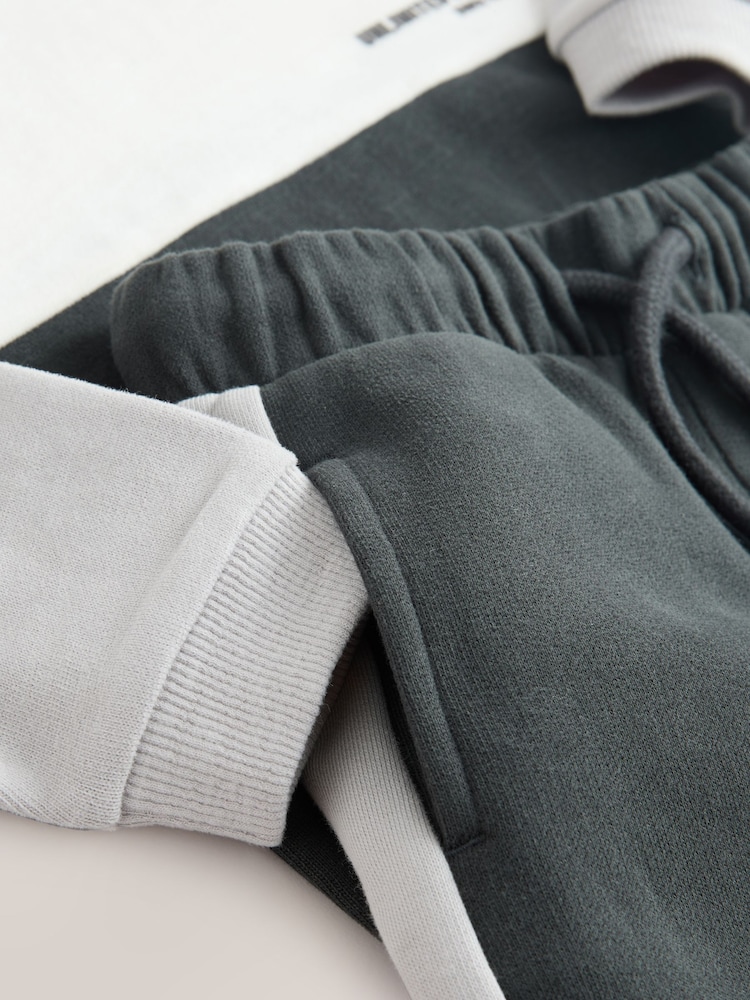 NEXT Jongen Set van sweatshirt en joggingbroek met logo Petrolblauw 92-98