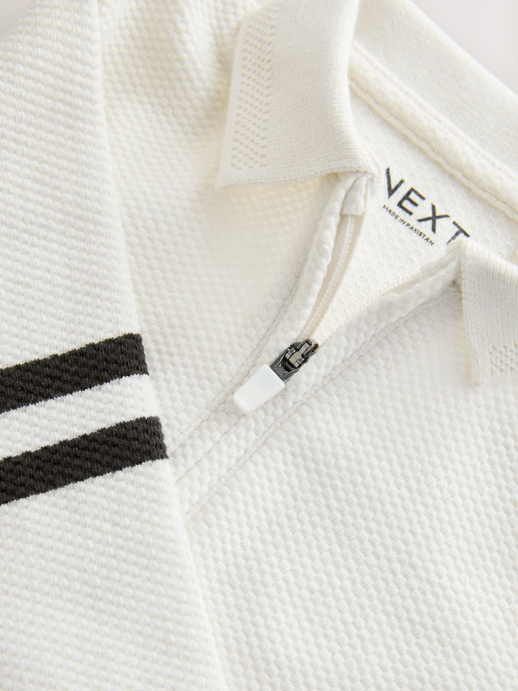 سحاب رمادي/أبيض - طقم من قميص بولو بأكمام طويلة وبنطلون رياضي (3 أشهر -7 سنوات) - Image 8 of 8 سحاب رمادي/أبيض - طقم من قميص بولو بأكمام طويلة وبنطلون رياضي (3 أشهر -7 سنوات) - Image 8 of 8