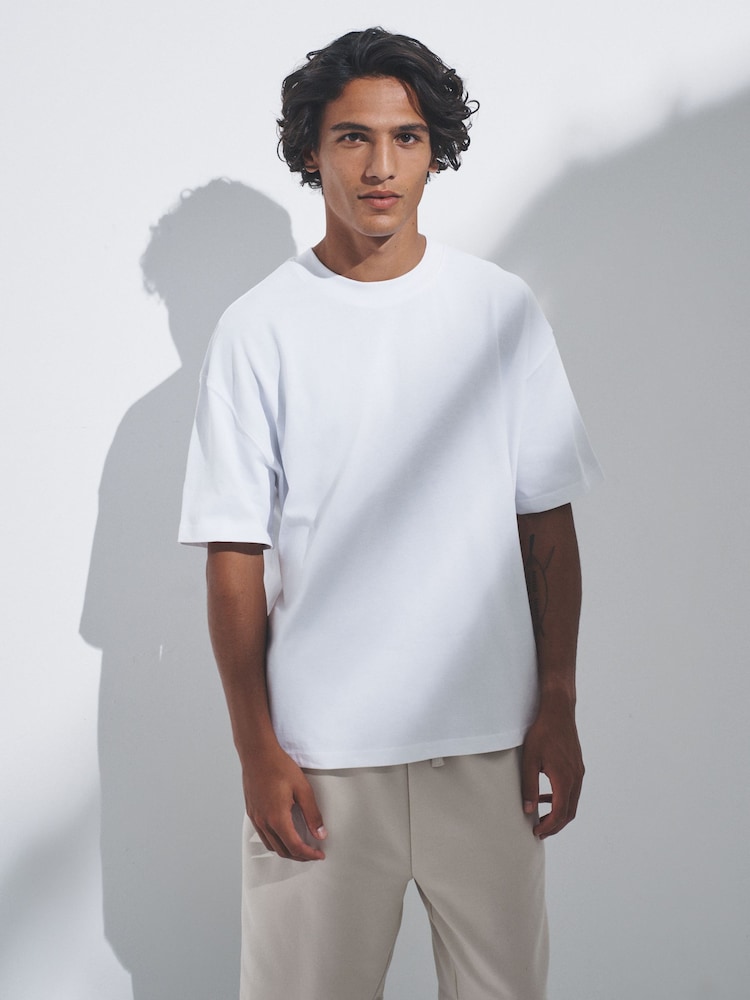 The Set Navy/Blue/Brown/White Oversized Fit 4 Pack Short Sleeve Cotton T-Shirts - Image 1 of 13 The Set Navy/Blue/Brown/White Oversized Fit 4 Pack Short Sleeve Cotton T-Shirts - Image 1 of 13
