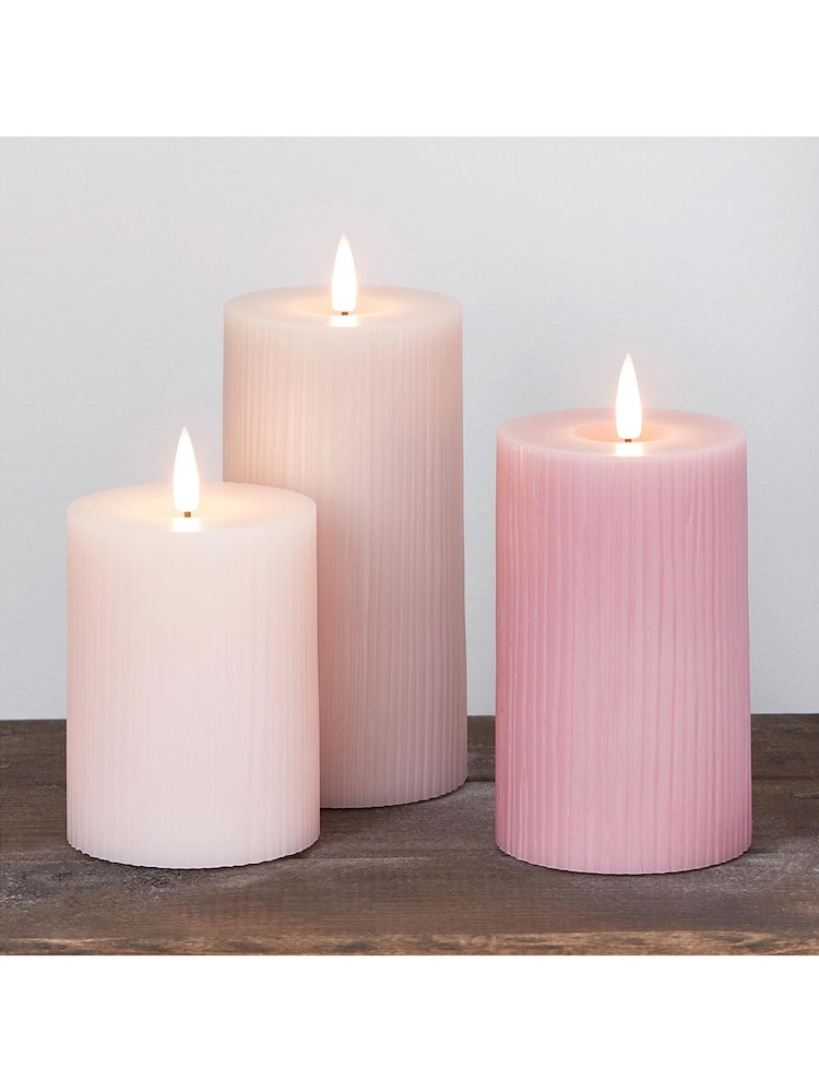 Lights4fun Pink TruGlow® Ribbed LED Pillar Candle Trio - Image 1 of 4