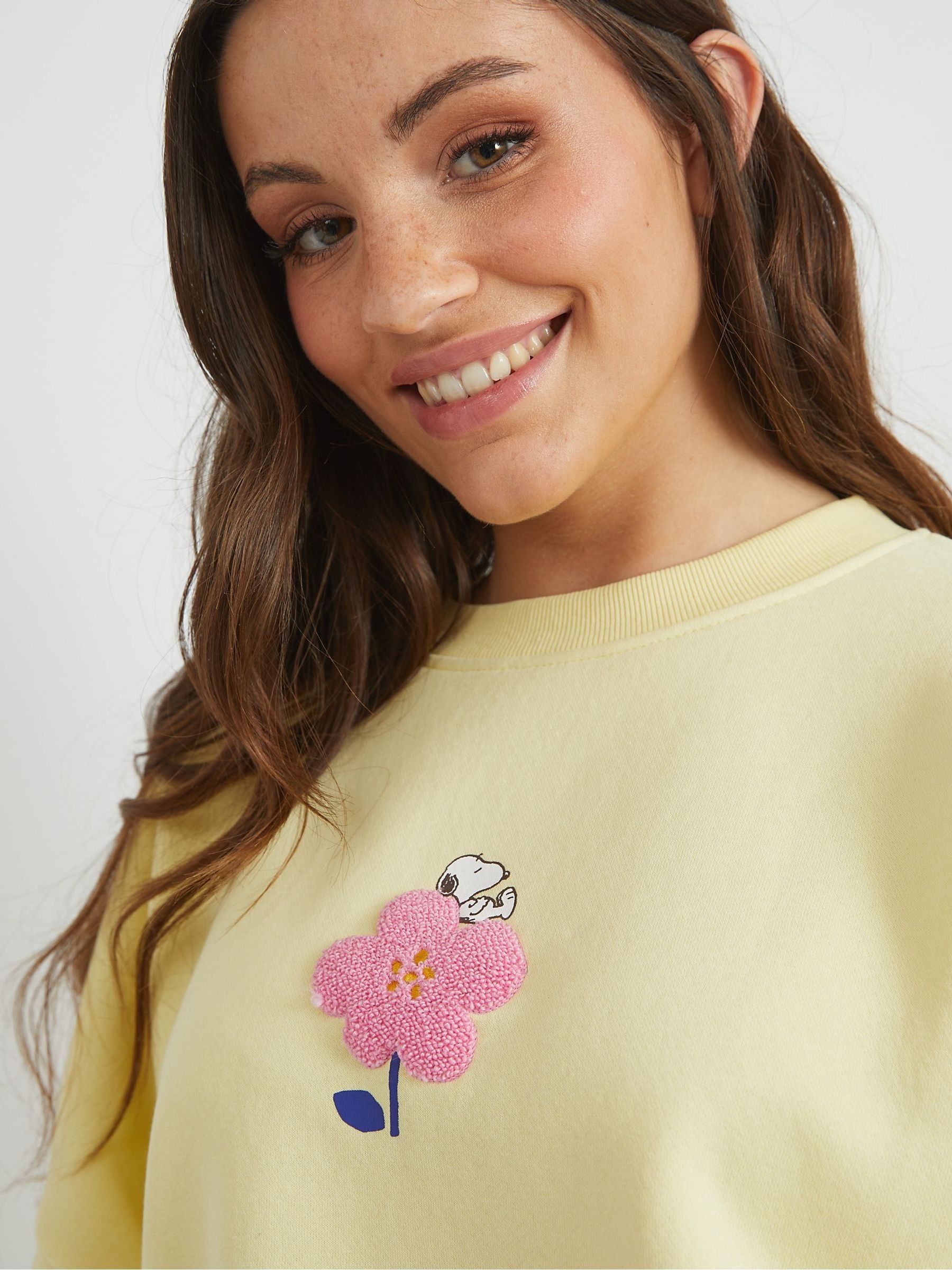 Buy Skinnydip Yellow Snoopy x Flower Sweatshirt from Next USA
