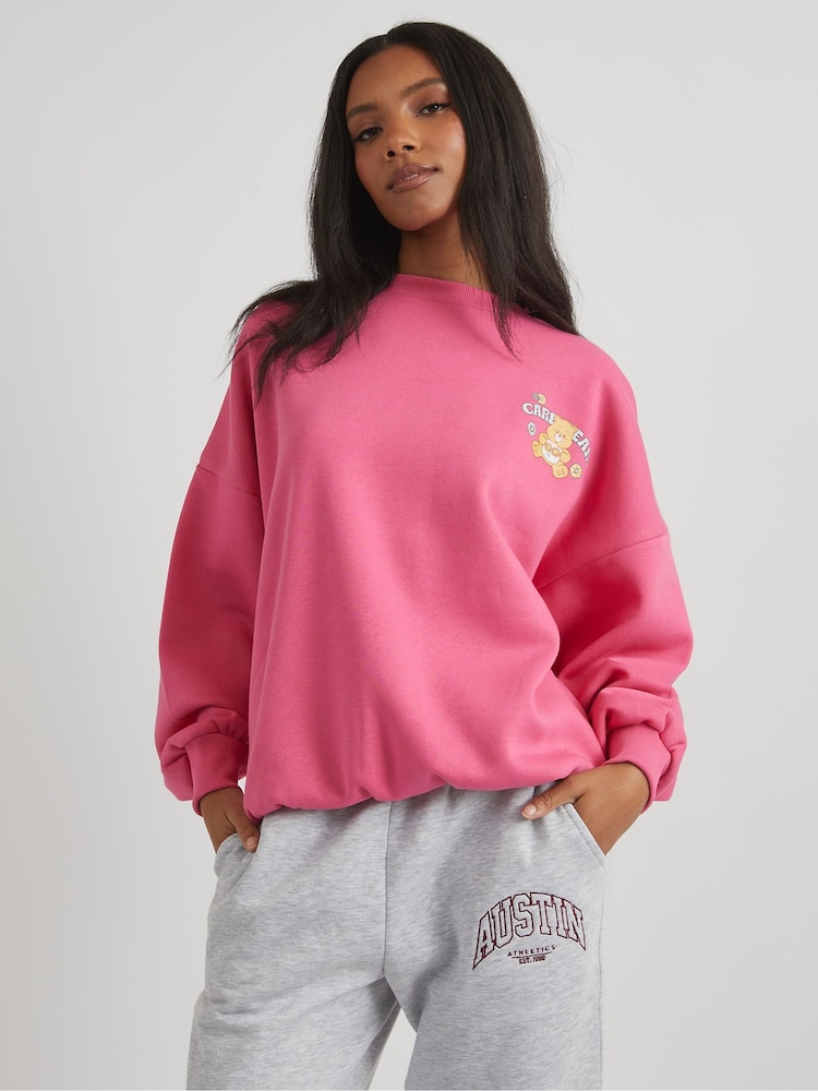 Skinnydip Pink Care Bears x Plant Seeds Grow Dreams Sweatshirt - Image 2 of 4 Skinnydip Pink Care Bears x Plant Seeds Grow Dreams Sweatshirt - Image 2 of 4