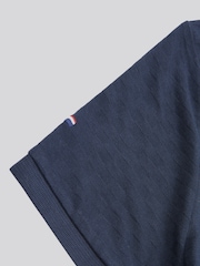 من U.S. Polo Assn. قميص بولو مربعات قطن 100% بارز الملمس للرجال - صورة 4 من 4