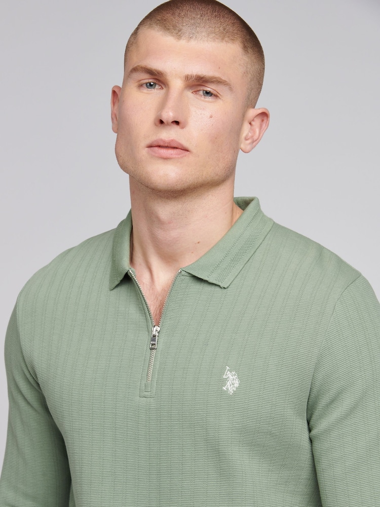 قميص بولو رجالي بملمس بارز وسحاب وأكمام طويلة من القطن 100% من U.S. Polo Assn. - صورة 2 من 7 قميص بولو رجالي بملمس بارز وسحاب وأكمام طويلة من القطن 100% من U.S. Polo Assn. - صورة 2 من 7