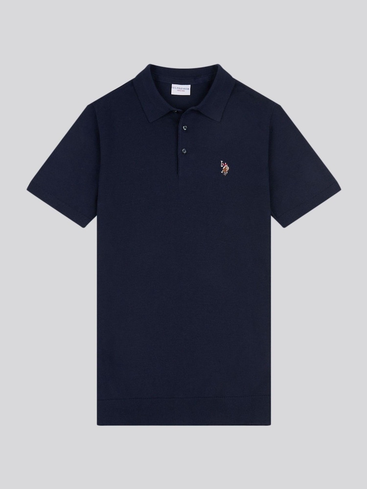أزرق داكن - من U.S. Polo Assn. قميص بولو قطن ممشط 100% للرجال - صورة 1 من 3