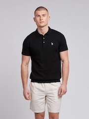 أسود - من U.S. Polo Assn. قميص بولو قطن ممشط 100% للرجال - صورة 1 من 7