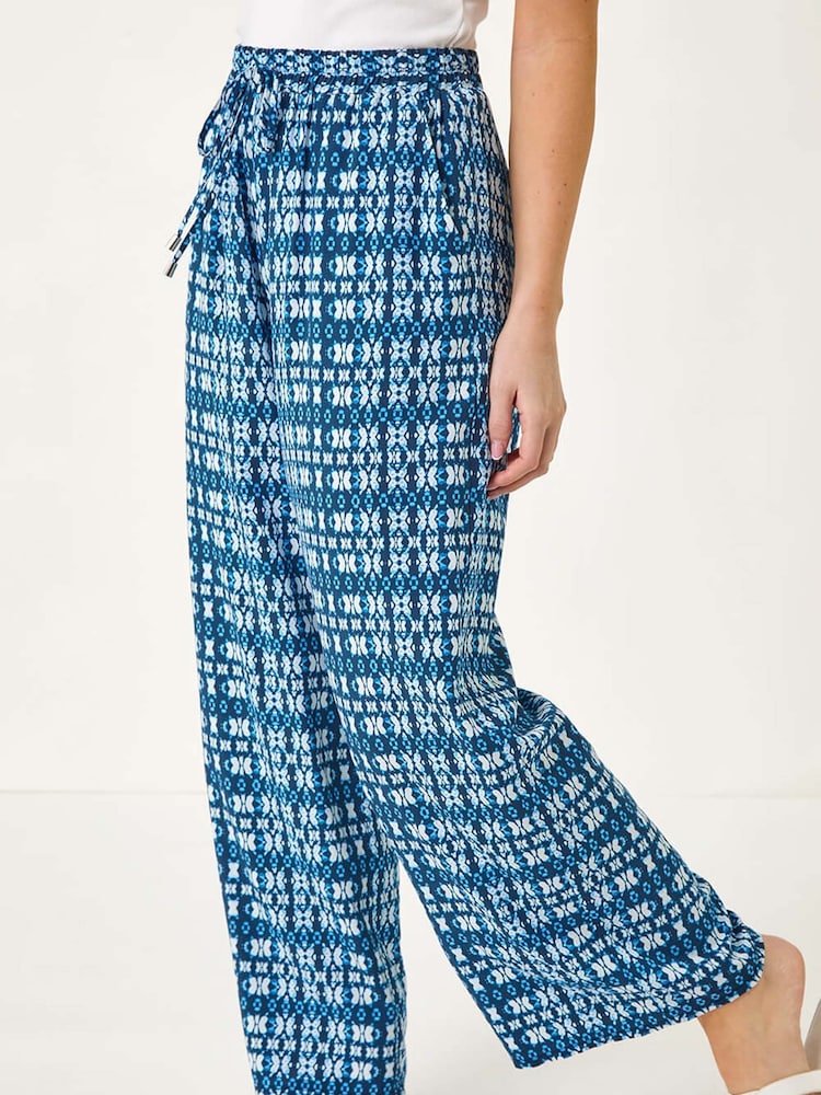 Buy Roman Blue Petite Wide Leg Trousers from the Next UK online shop