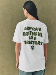 White/Khaki Green Official The Traitors License "Are you a Faithful or a Traitor?" Relaxed Fit Graphic T-Shirt - Image 1 of 5