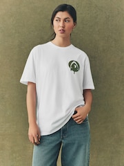 White/Khaki Green Official The Traitors License "Are you a Faithful or a Traitor?" Relaxed Fit Graphic T-Shirt - Image 4 of 5