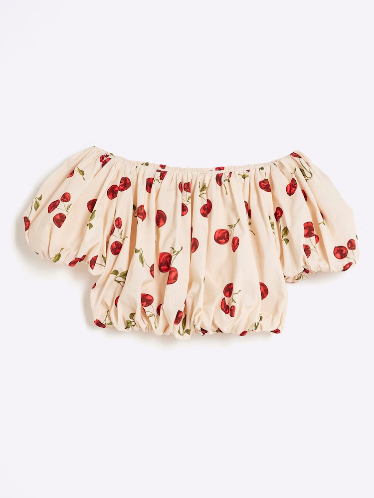 Top de algodón 100 % con diseño abullonado y escote bardot para niñas de River Island - Imagen 1 de 3
