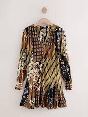 Estampa animal brown emendada - Vestido mini de manga comprida evasê - Imagem 1 de 3