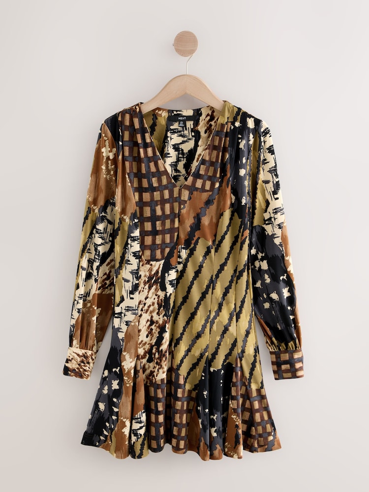 Estampa animal brown emendada - Vestido mini de manga comprida evasê - Imagem 1 de 3