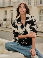 Monochrome Black Ecru Cow Print Teddy Borg Cosy Quarter Zip Fleece - Image 1 of 8