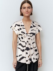 White/Black Animal Print Pintuck V-Neck Top - Image 1 of 5