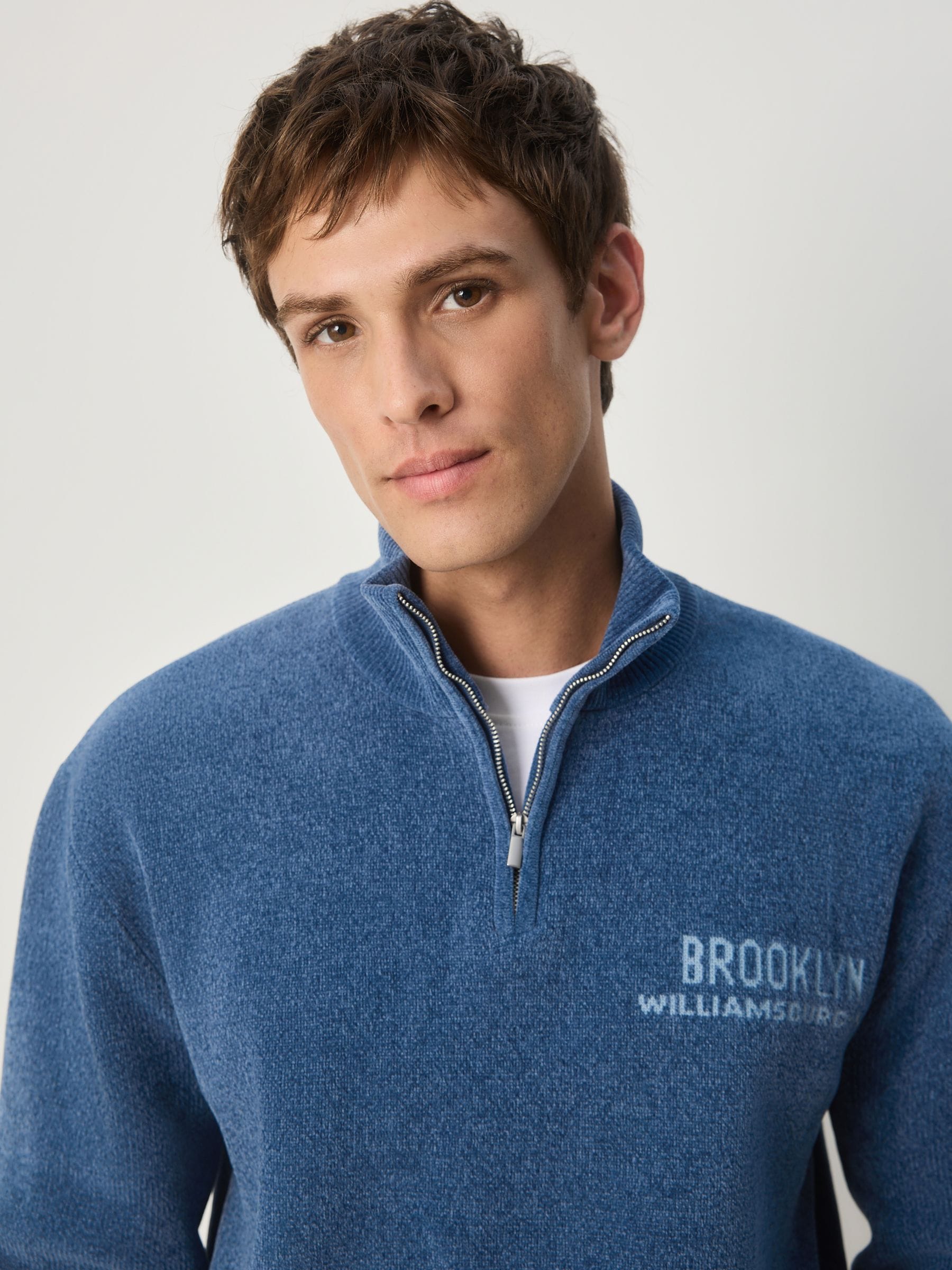 Buy Blue Regular Fit Brooklyn Graphic Chenille Quarter Zip Neck
