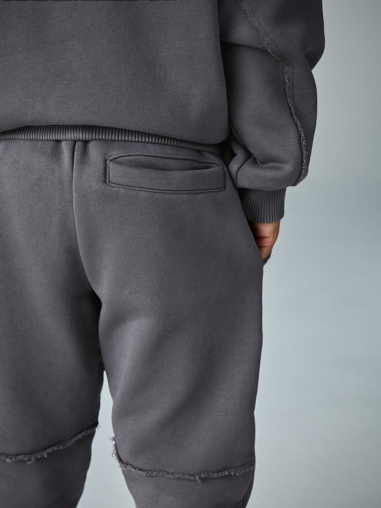 smALLSAINTS Charcoal Grey Embossed Logo Washed Hoodie and Joggers Younger Boys Set - Image 6 of 6 smALLSAINTS Charcoal Grey Embossed Logo Washed Hoodie and Joggers Younger Boys Set - Image 6 of 6