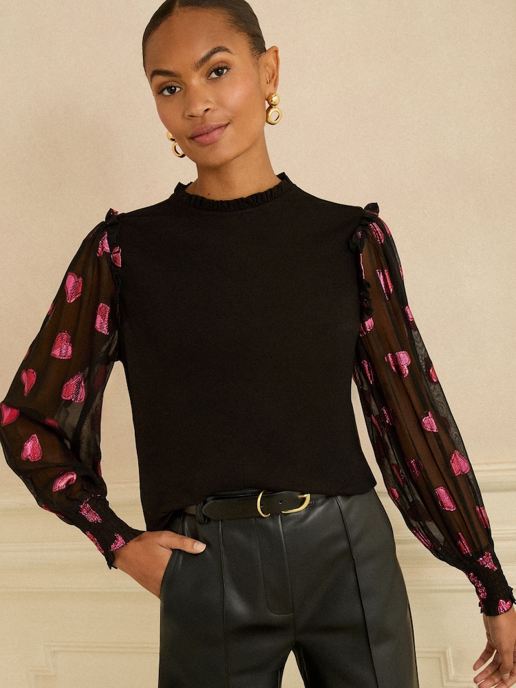 Love & Roses Black and Red Heart Print Petite Mixed Jersey Sheer Sleeve Top - Image 1 of 4