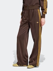 adidas originals Brown/Yellow Firebird Loose Trackpants - Image 1 of 6