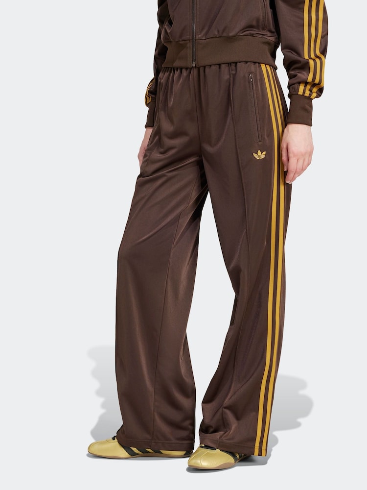 adidas originals Brown/Yellow Firebird Loose Trackpants - Image 1 of 6