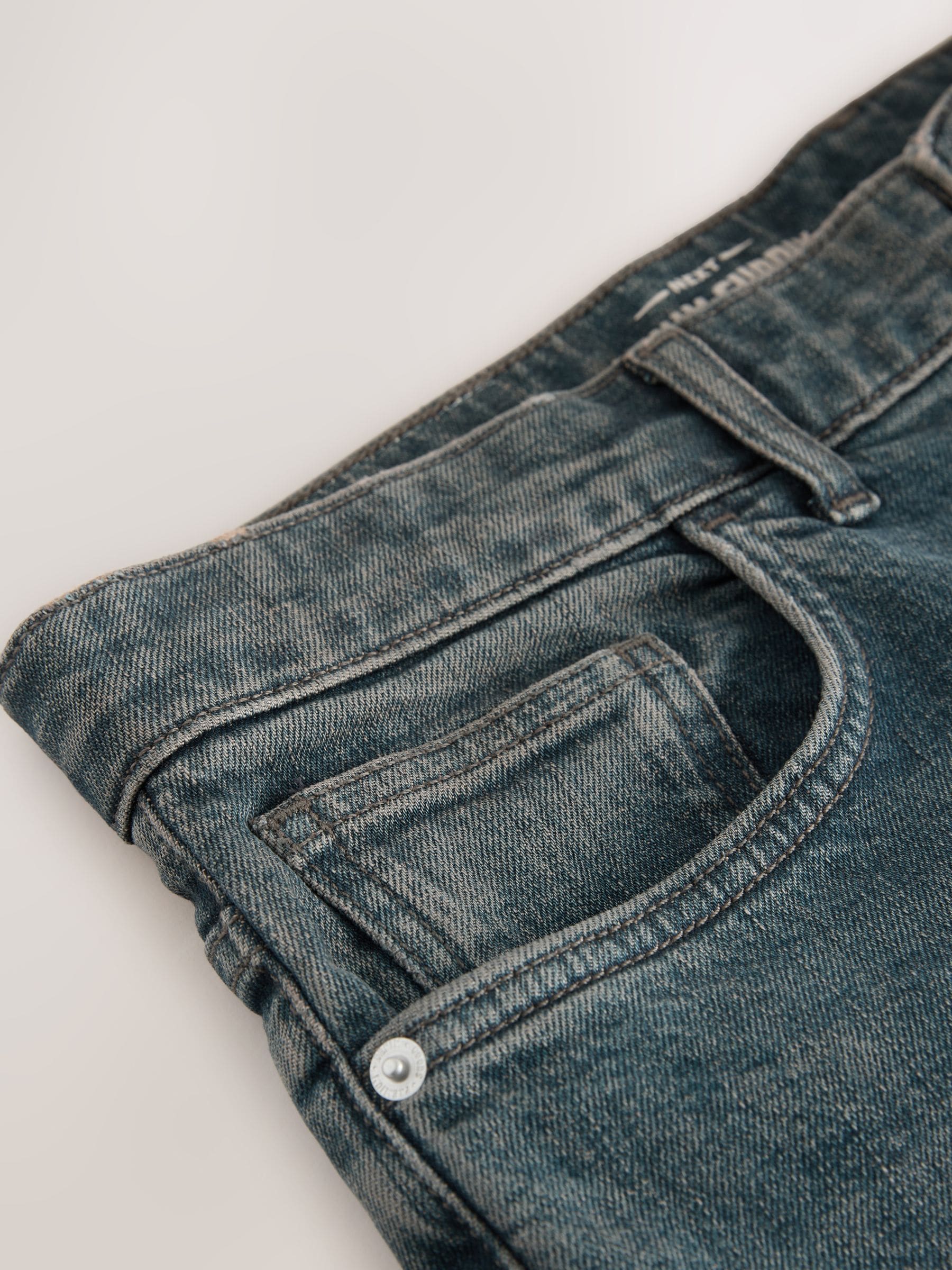 Buy Dark Tint Bootcut Vintage Wash Denim Jeans from Next USA
