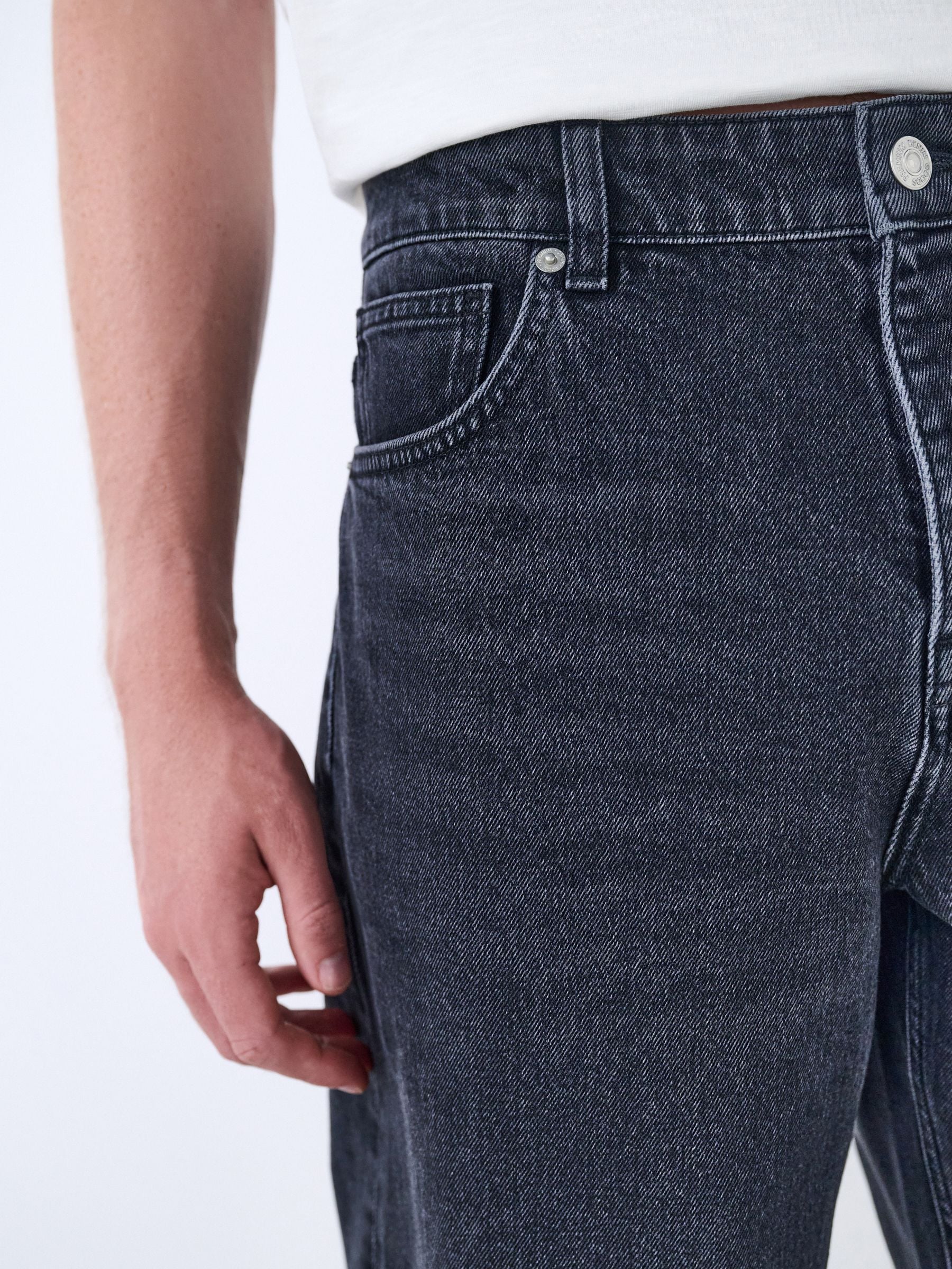 Buy Black Relaxed Tapered Fit Vintage Wash Denim Jeans from Next