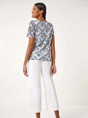 Top de encaje elástico con estampado de Roman - Imagen 2 de 5