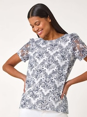 Top de encaje elástico con estampado de Roman - Imagen 4 de 5