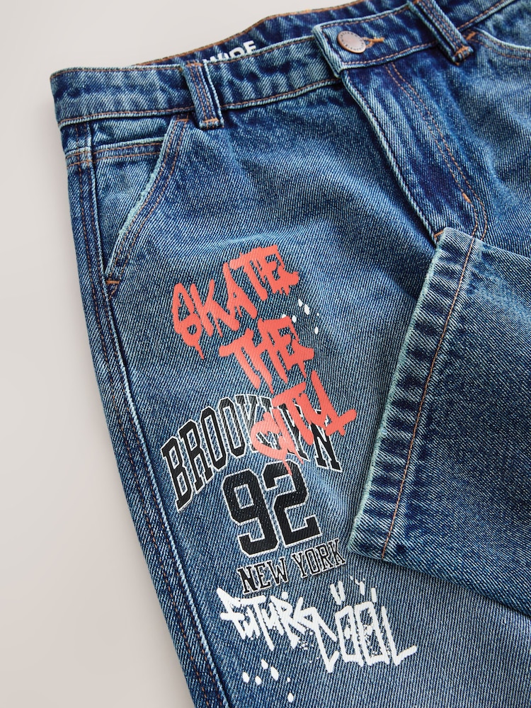 Varsity All Over Print Mid Blue Denim Wide Fit Authentic Jeans (3-16yrs) - Image 4 of 4 Varsity All Over Print Mid Blue Denim Wide Fit Authentic Jeans (3-16yrs) - Image 4 of 4