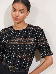 Lipsy Black Polka Dot Lace Crinkle Short Sleeve Top - Image 1 of 4