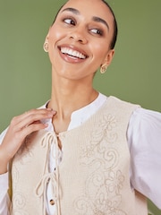 Yumi Cream 100% Cotton Knitted Tie Front Waistcoat With Floral Details - Image 3 of 5