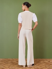 Yumi Cream 100% Cotton Knitted Tie Front Waistcoat With Floral Details - Image 4 of 5