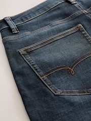 Blue Mid Indigo Relaxed Fit Motionflex Jeans - Image 12 of 12