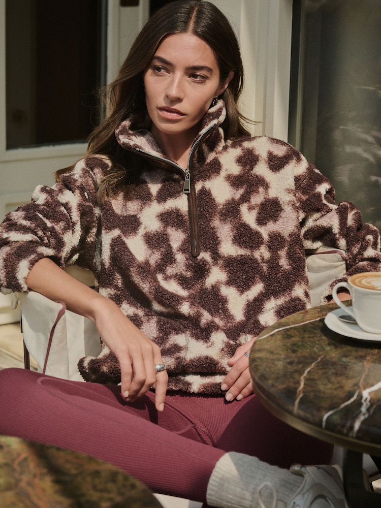 Chocolate Brown/Pink Leopard Print 100% Recycled Polyester Teddy Borg Cosy Quarter Zip Fleece - Image 1 of 7 Chocolate Brown/Pink Leopard Print 100% Recycled Polyester Teddy Borg Cosy Quarter Zip Fleece - Image 1 of 7