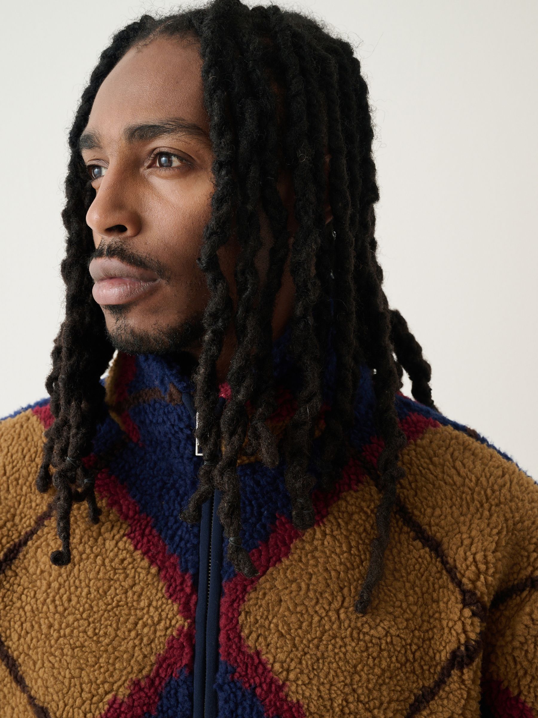 Buy Navy Blue/Tan Brown Argyle Zip Through Printed Fleece from