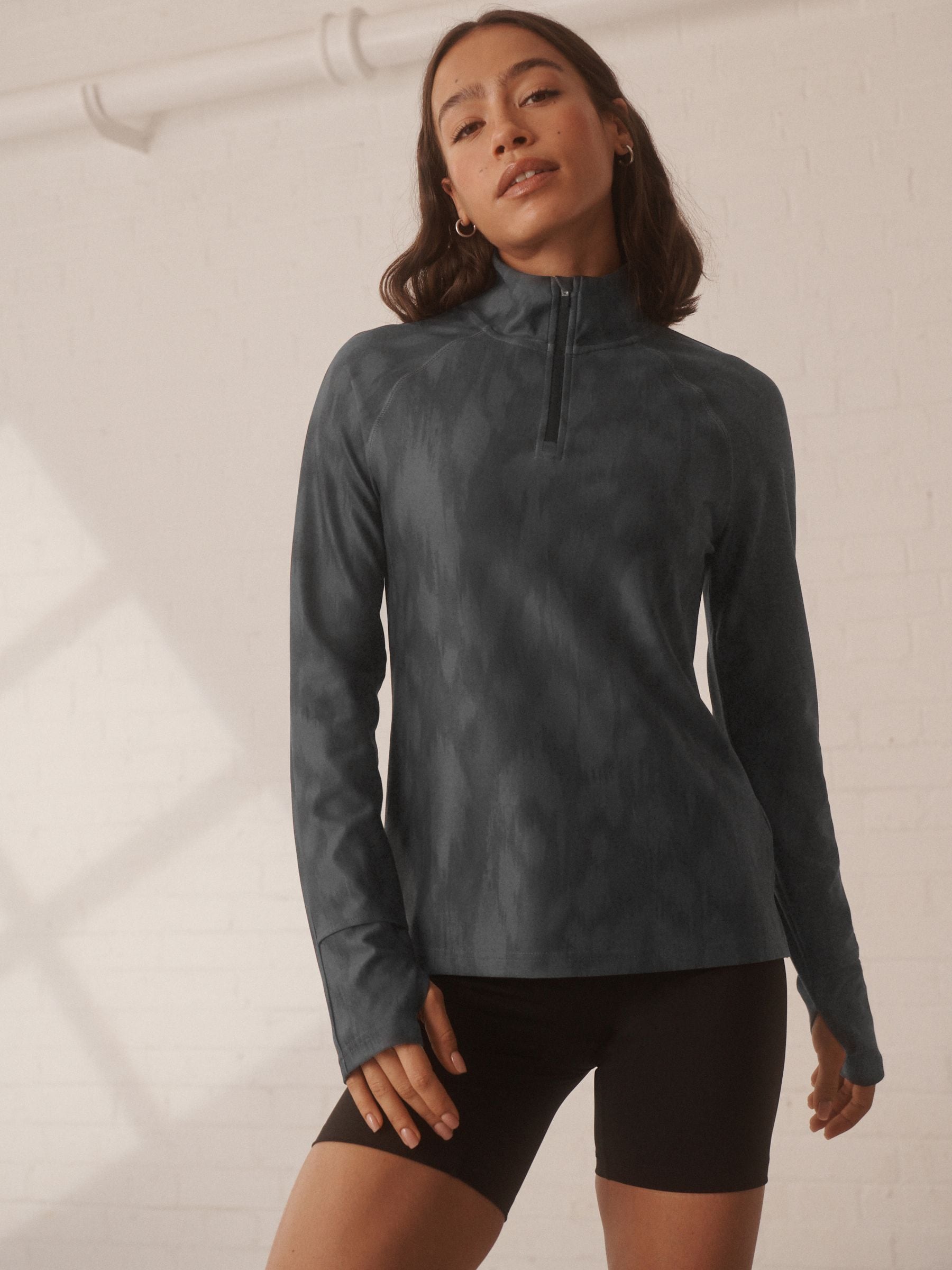 black zip running top