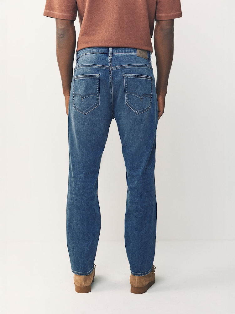 Blue Regular Tapered Fit Lightweight Motion Flex Denim Jeans - Image 2 of 10