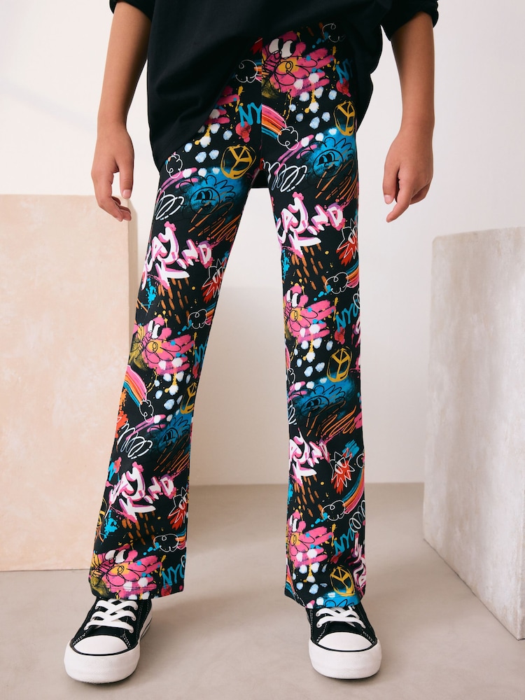 Black Graffiti Flare Leggings (3-16yrs) - Image 1 of 8 Black Graffiti Flare Leggings (3-16yrs) - Image 1 of 8