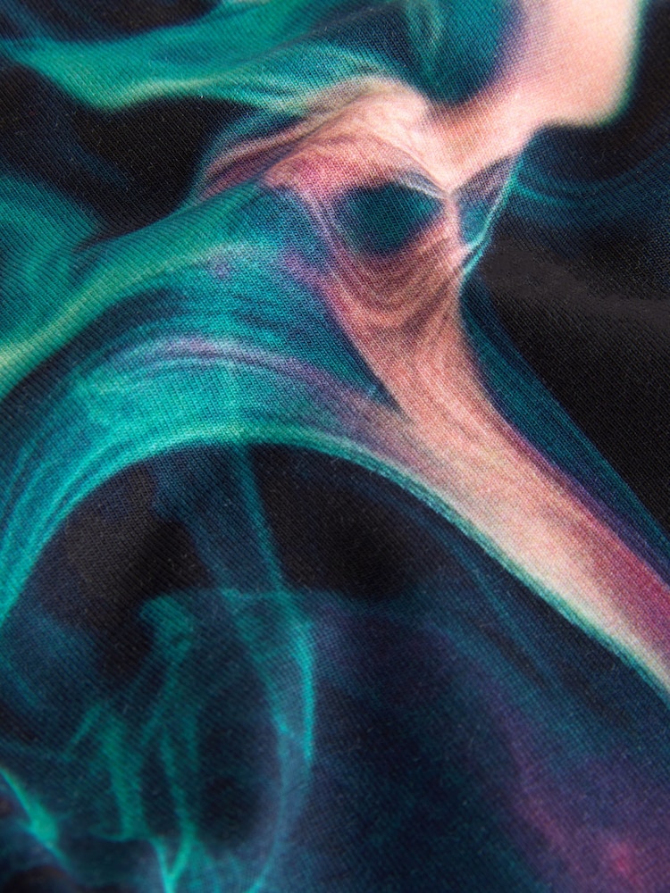 צבע שחור/סגול בדוגמת מערבולת - טייצים (3-16שנים) - תמונה 7 מתוך 7