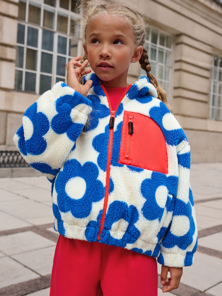 Blau-Weiß Blume - Kapuzenjacke aus Borg-Fleece mit Reißverschluss (3–16 J.) - Bild 1 von 9 Blau-Weiß Blume - Kapuzenjacke aus Borg-Fleece mit Reißverschluss (3–16 J.) - Bild 1 von 9