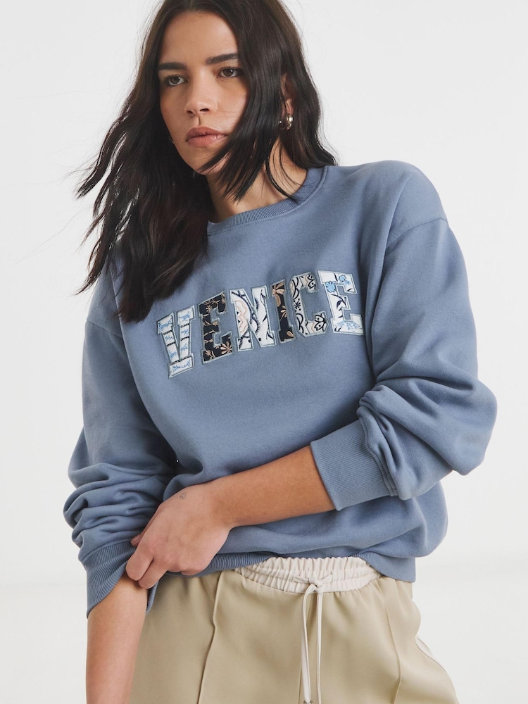 Simply Be Blue Venice Slogan Sweatshirt - Image 1 of 4 Simply Be Blue Venice Slogan Sweatshirt - Image 1 of 4