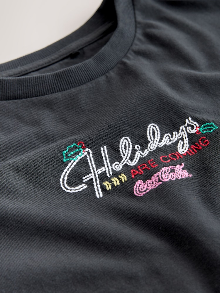 Black Christmas Coca Cola Embroidered Graphic Short Sleeve T-Shirt - Image 10 of 10 Black Christmas Coca Cola Embroidered Graphic Short Sleeve T-Shirt - Image 10 of 10