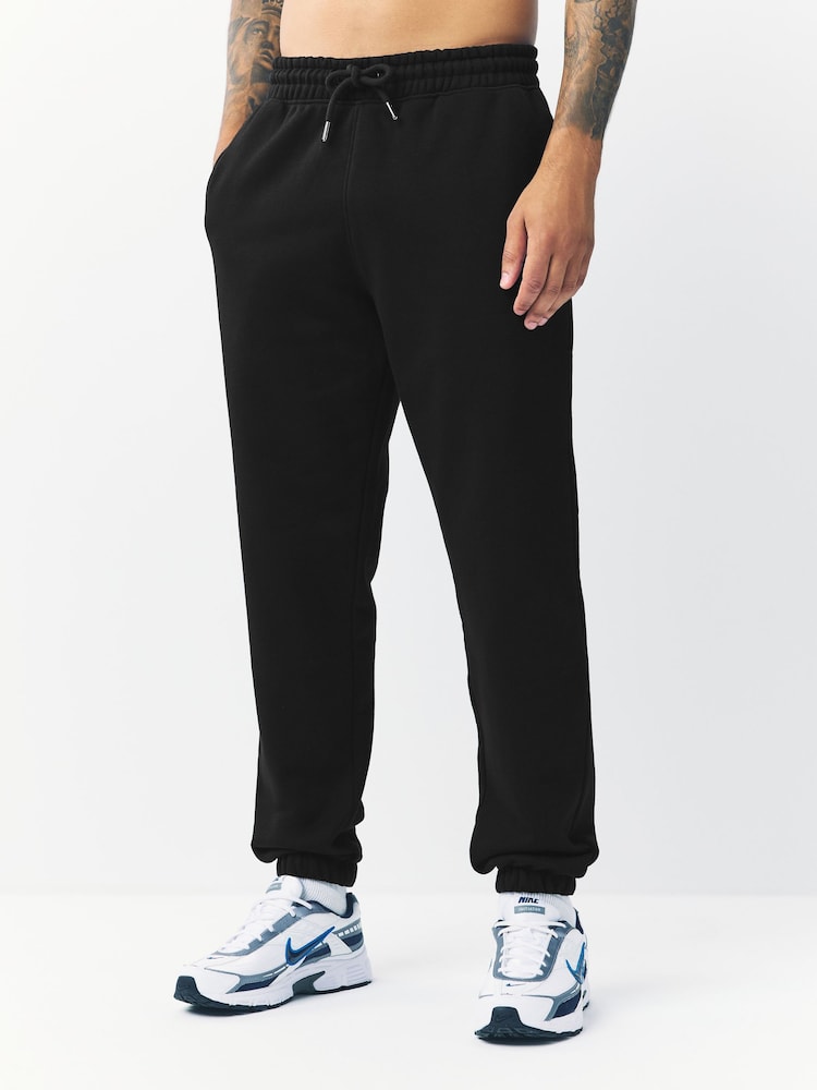 Black Relaxed Fit Cotton Rich Jersey Joggers - Image 1 of 8 Black Relaxed Fit Cotton Rich Jersey Joggers - Image 1 of 8